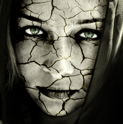 Face of woman with cracked skin